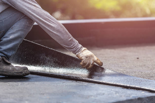 Professional Basement Waterproofing technician working in Milford, IN